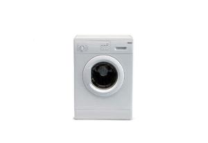 a washing machine isolated on a white background at Flat in Lignano in Lignano Sabbiadoro