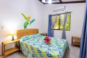 Ένα ή περισσότερα κρεβάτια σε δωμάτιο στο Bungalows Ache Cozy House