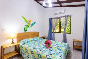 Ένα ή περισσότερα κρεβάτια σε δωμάτιο στο Bungalows Ache Cozy House