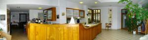 a salon with a wooden counter in a room at Sontheimer Wirtshäusle in Sontheim im Stubental +10 photos