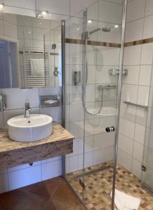 ห้องน้ำของ BEST LONGSTAY INN, homestead and extended stay - KRAL Hotels Erlangen