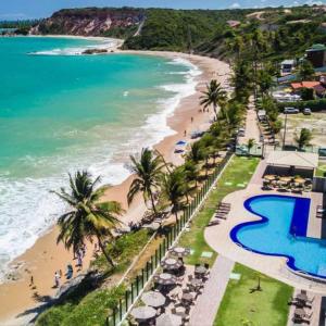 an aerial view of the beach and the ocean at Tabatinga Flat - Beira Mar in Conde