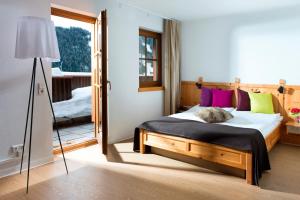 Postel nebo postele na pokoji v ubytování Hotel Goldried