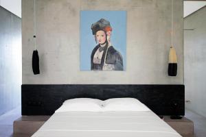 Postel nebo postele na pokoji v ubytování ecoSuites
