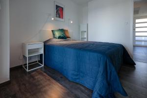 Posteľ alebo postele v izbe v ubytovaní Marina Apartman Hotel