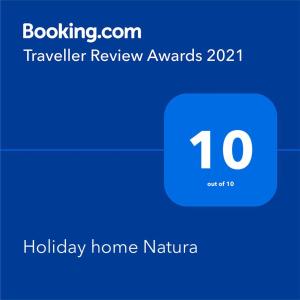 Certifikat, nagrada, logo ili neki drugi dokument izložen u objektu Holiday home Natura