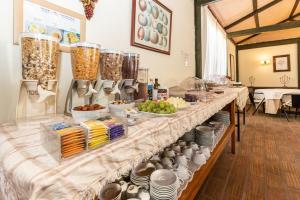 
a kitchen filled with lots of different types of food at Quinta do Caracol in Tavira
