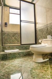 Koupelna v ubytování Hotel El Auca