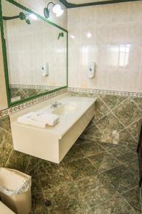 Koupelna v ubytování Hotel El Auca