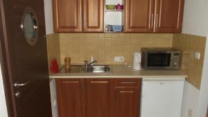 Η κουζίνα ή μικρή κουζίνα στο Pokoje typu Studio OLSZYNA 27