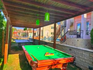 a pool table in the backyard of a house at 4S Hotel Dahab in Dahab