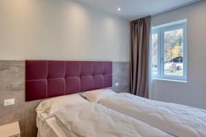 Postel nebo postele na pokoji v ubytování Barambana Rooms