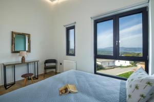 Posteľ alebo postele v izbe v ubytovaní VILLA FULMAR