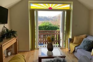 Zdjęcie z galerii obiektu Semi Detached Cottage Snowdonia with hot tub w mieście Tal-y-Cafn