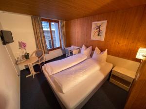 Voodi või voodid majutusasutuse Dinh Residence toas