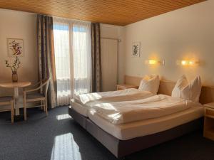 Voodi või voodid majutusasutuse Dinh Residence toas