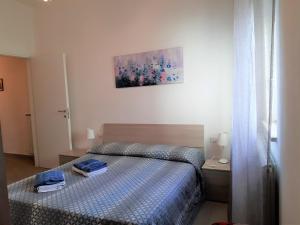 Posteľ alebo postele v izbe v ubytovaní La Corte di Marino