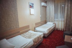 Postel nebo postele na pokoji v ubytování Magnum + 21 fotografií
