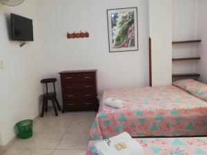 Postel nebo postele na pokoji v ubytování Hotel Real Pólux