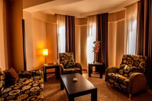 Posezení v ubytování Rumi Hotel