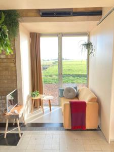 Gallery image of Tiny house Van hoogspanning naar ontspanning in Wirdum