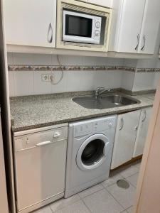 A kitchen or kitchenette at Céntrico, Gran Vía Sol Plaza Mayor