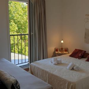 Un pat sau paturi într-o cameră la Mini villa Messicana 5 pers piscine 500 m plage