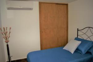 A bed or beds in a room at Finca Ulises Las Hayas