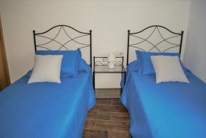 A bed or beds in a room at Finca Ulises Las Hayas