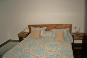 A bed or beds in a room at Finca Ulises Las Hayas