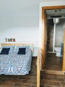 A bed or beds in a room at Finca Ulises Las Hayas