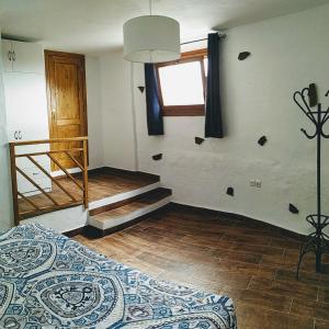 A bed or beds in a room at Finca Ulises Las Hayas