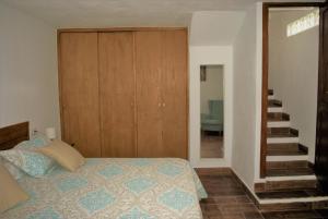 A bed or beds in a room at Finca Ulises Las Hayas