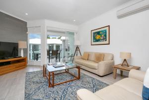 TV o dispositivi per l'intrattenimento presso Seascape Holidays at Beaches Port Douglas