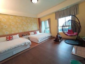 Katil atau katil-katil dalam bilik di Sky Bird Garden B&B
