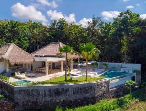 an aerial view of a villa with a swimming pool at Villa Passiondream including private cook & butlerservice in Jasri