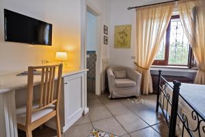 Postel nebo postele na pokoji v ubytování B&B Il Vicolo