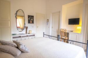 Postel nebo postele na pokoji v ubytování B&B Il Vicolo