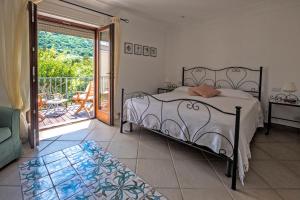 Postel nebo postele na pokoji v ubytování B&B Il Vicolo