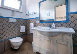 Koupelna v ubytování B&B Il Vicolo + 37 fotografií