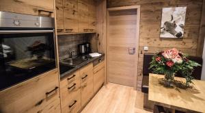 Kuchyň nebo kuchyňský kout v ubytování Alpenstadthotels