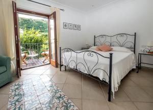 Postel nebo postele na pokoji v ubytování B&B Il Vicolo