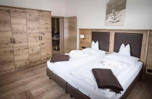 Postel nebo postele na pokoji v ubytování Alpenstadthotels
