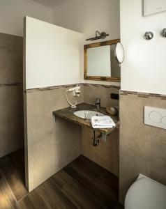 Koupelna v ubytování Alpenstadthotels