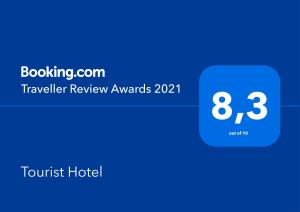 a screenshot of a hotel room with the text traveler review at Tourist Hotel in Minsk