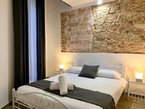 Posteľ alebo postele v izbe v ubytovaní Vila Badalona