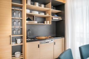 Kuchyňa alebo kuchynka v ubytovaní Sporthotel Chalet