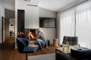 TV a/nebo společenská místnost v ubytování Sporthotel Chalet