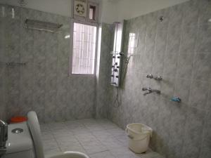 Koupelna v ubytování Vatsalyam Home Stay