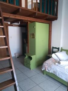 A bed or beds in a room at Haus Pigadi